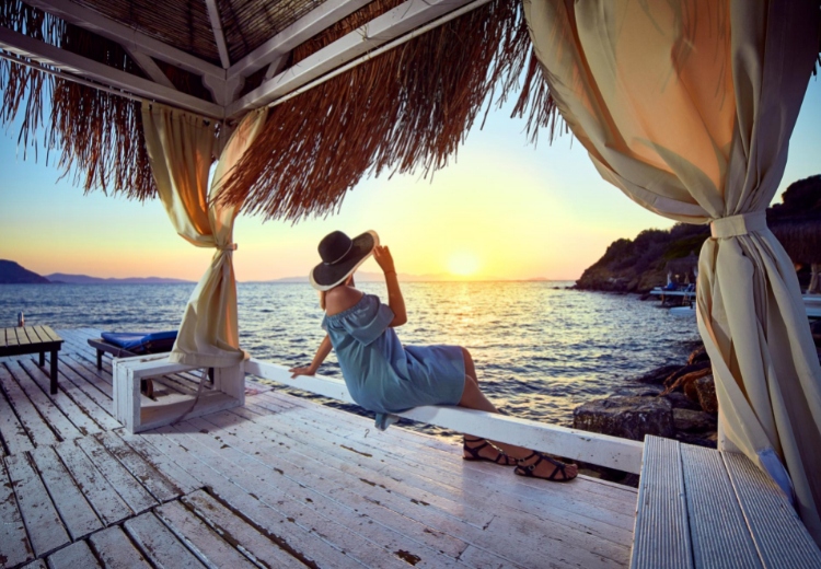 Bodrum, woman sitting near the ocean